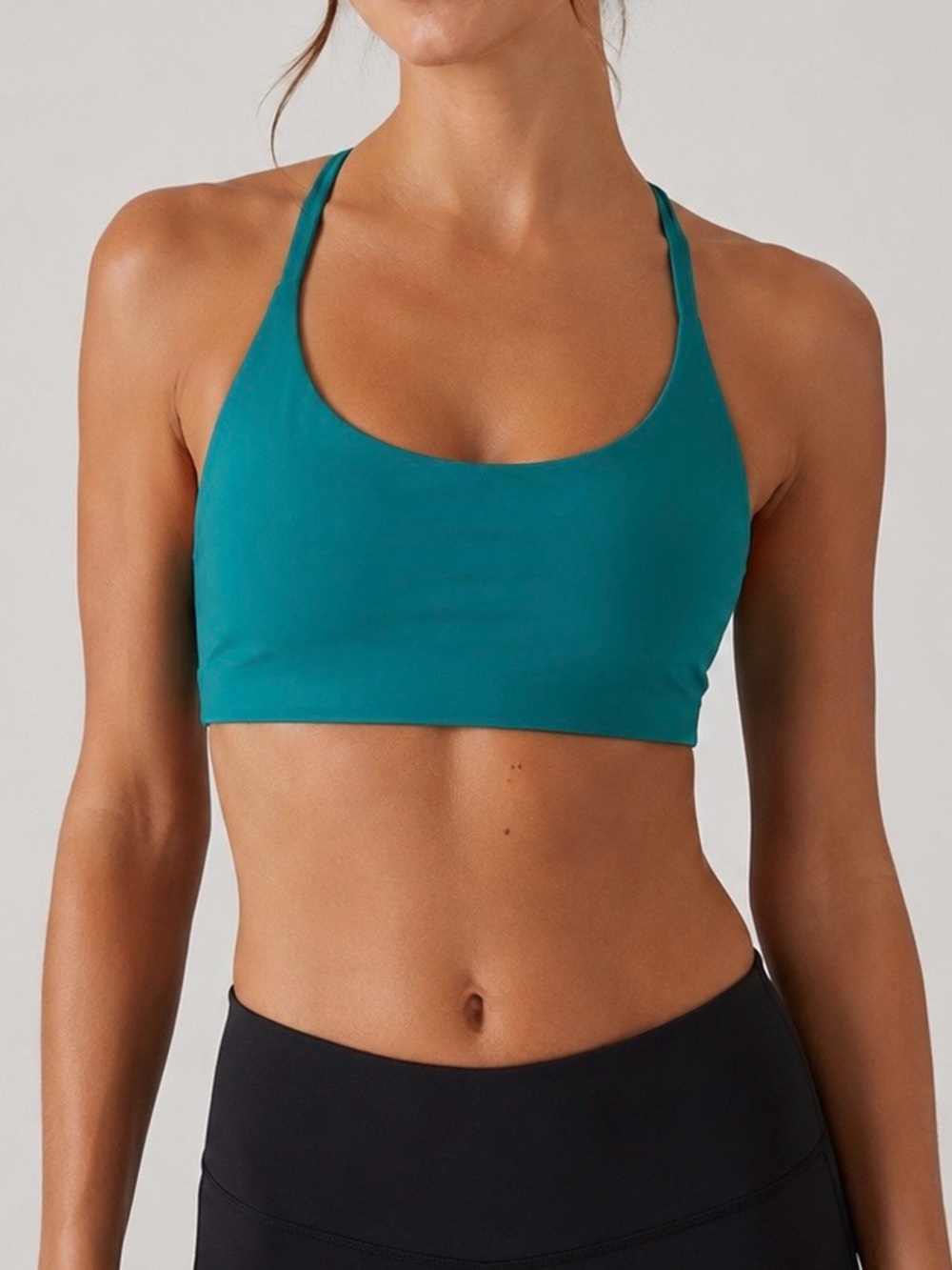 Athleta Teal Racerback Sports Bra. Size XS